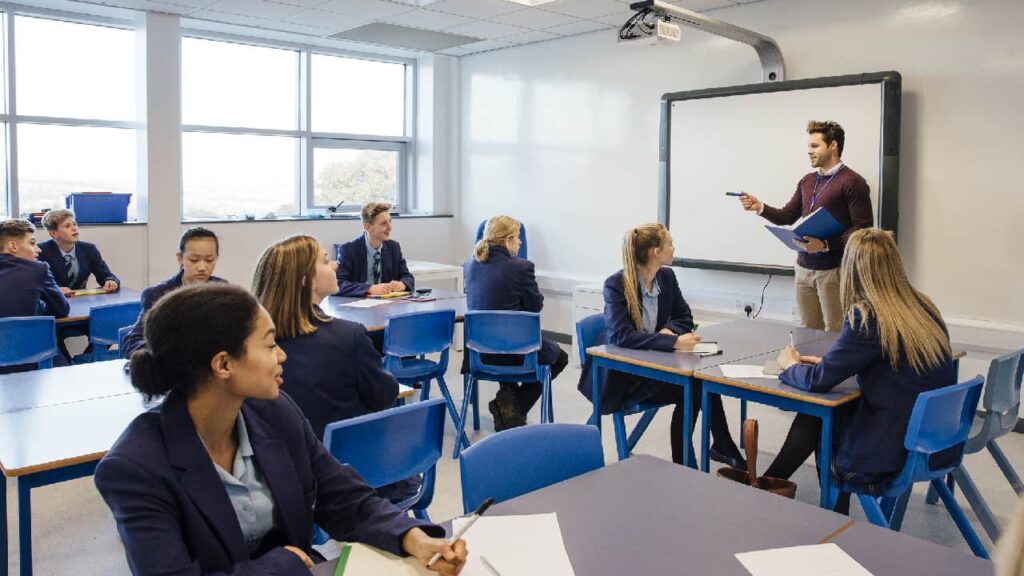 High school teacher introducing himself to his new class