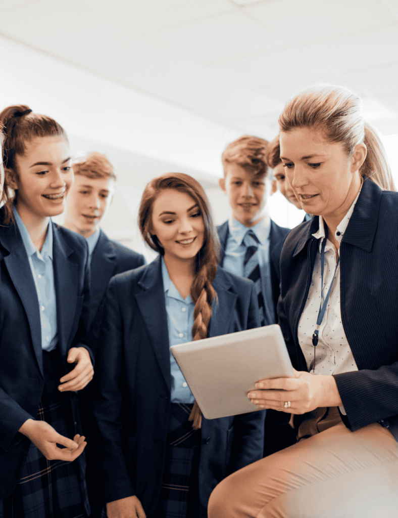 Female teacher speaks with high school students